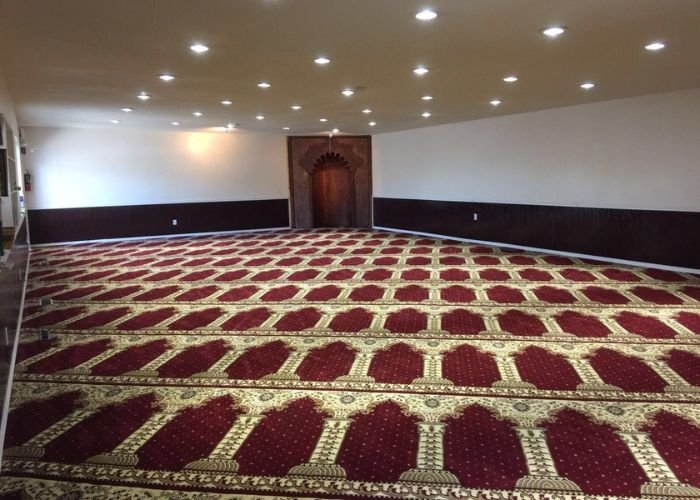 Mosque carpet installation